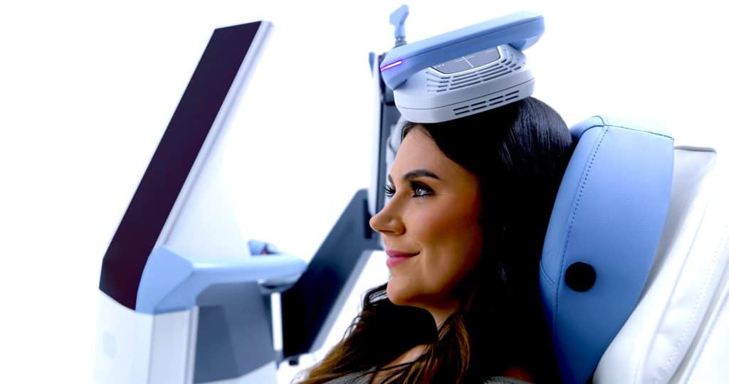 EXOMIND by BTL – Calming the Prefrontal Cortex & Restoring Sleep at Clique Clinic - Exomind PIC Female Model3 0215 ENUS100 2